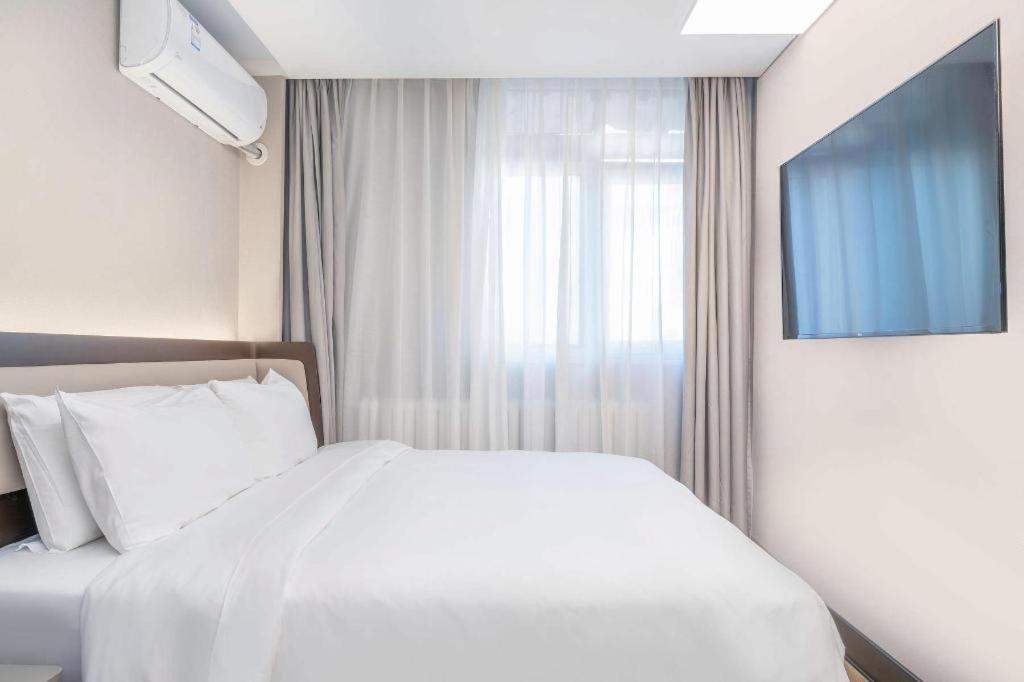 Hanting Hotel Beijing Wangfujing מראה חיצוני תמונה